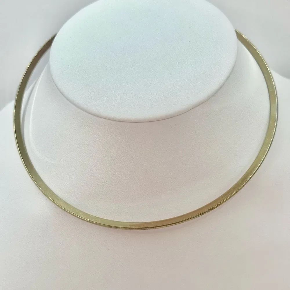 Gold tone choker necklace